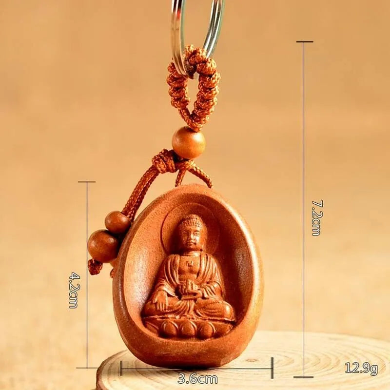 Eight patron saint keychains made of natural Taomu wood in orange colour, each measuring 10x3.2x4cm