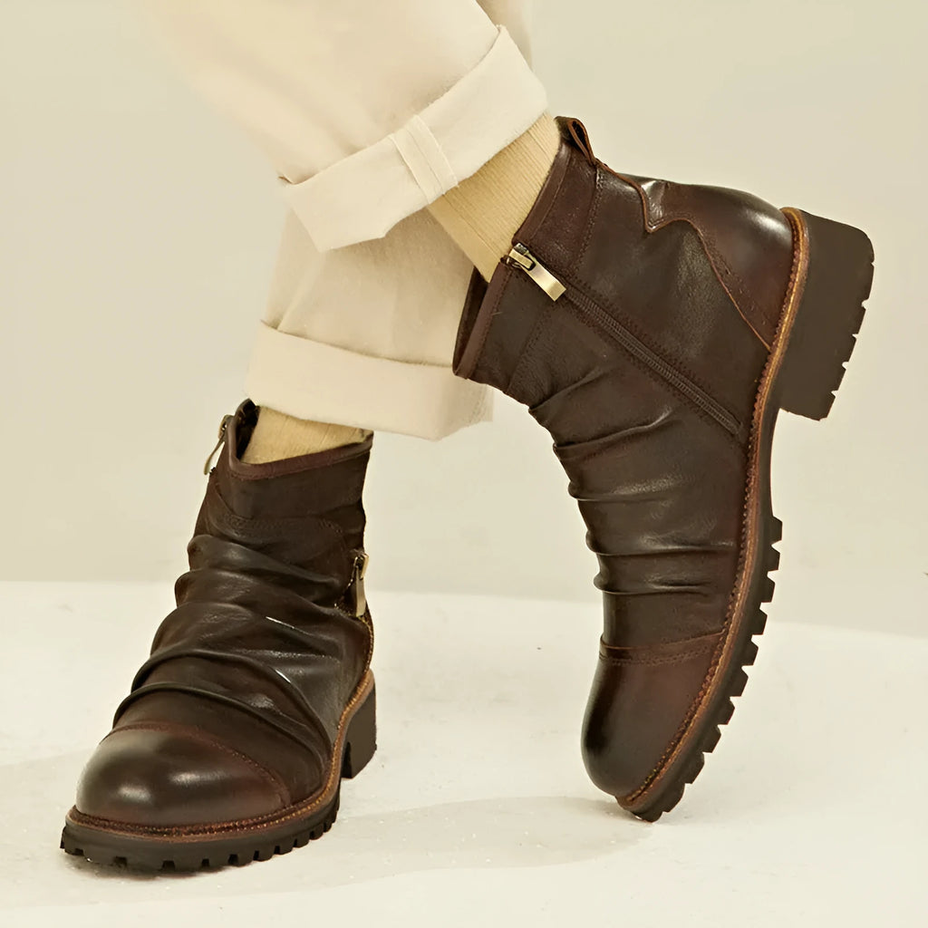 Black high-top Martin boots with side zip and horseshoe heel on a plain background.