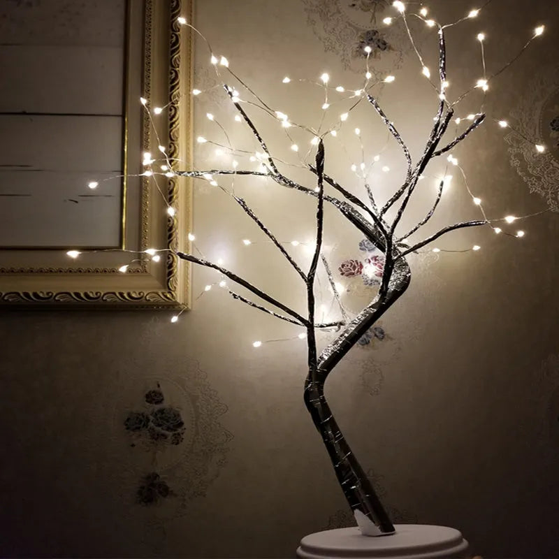 Tree light night light with bonsai-style design, warm white LED lights, adjustable branches, and USB plug.