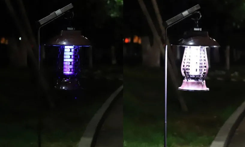 White and purple solar-powered mosquito repellent lamp for outdoor garden use.