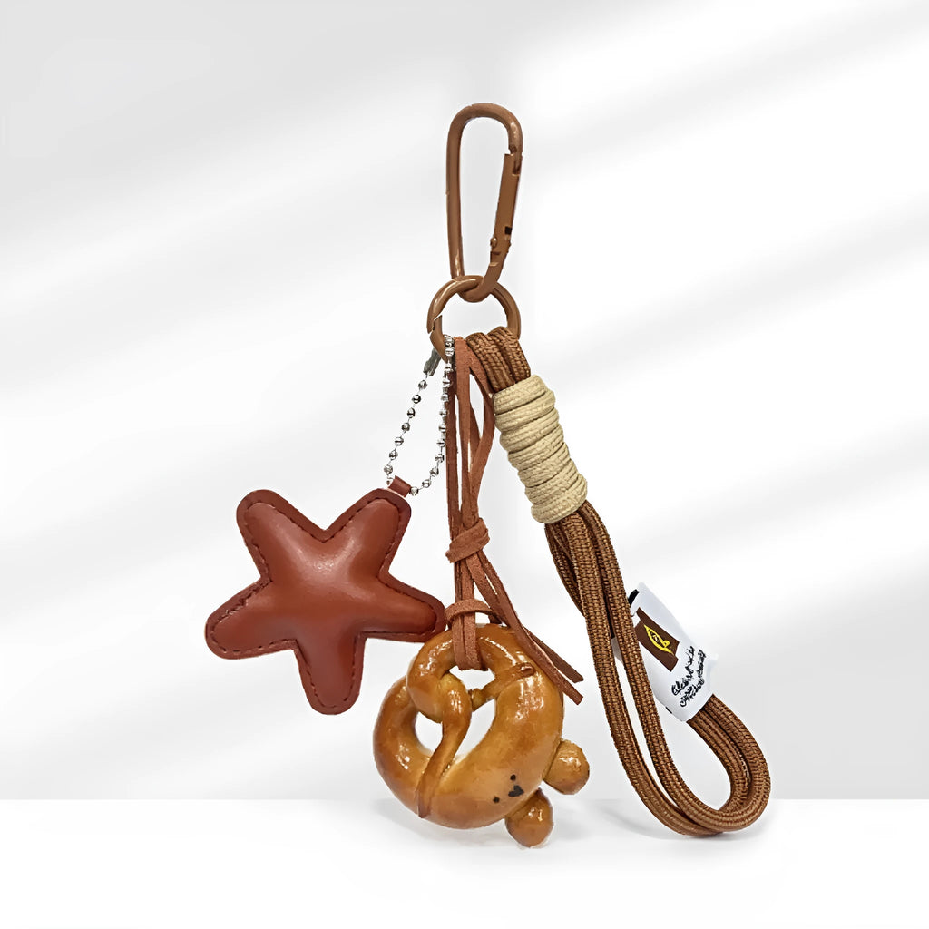 Handmade soda bread style handbag pendant with brown carrying strap