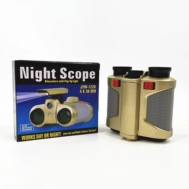 Children's telescope with light binoculars on a green field during sunset, showing the built-in light feature