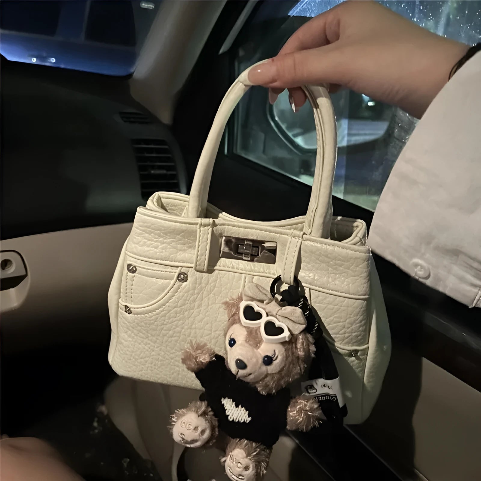 Women's denim-style shoulder bag in soft PU material with standard size and polyester lining