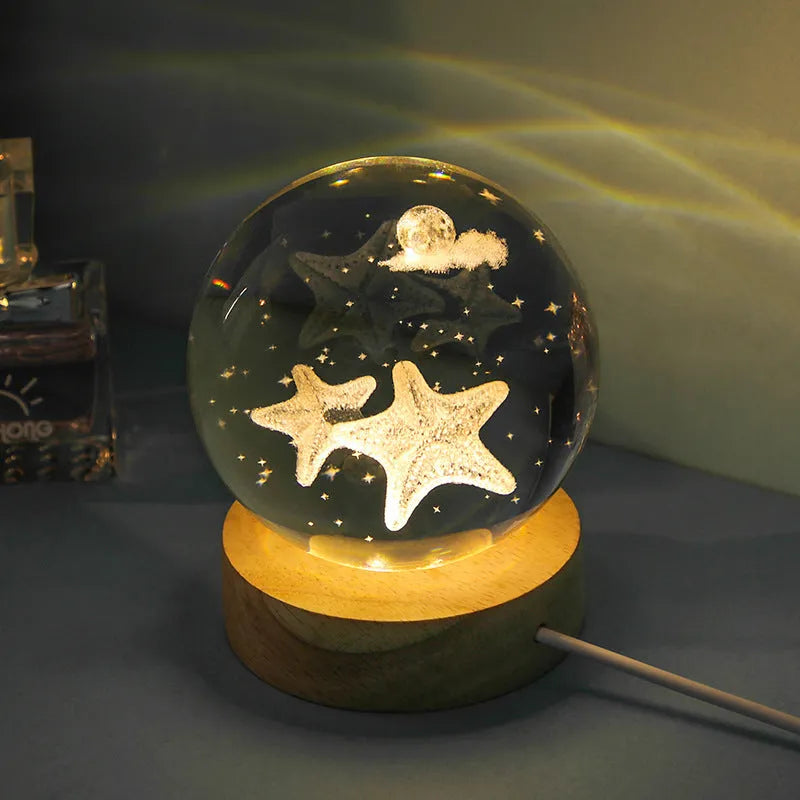 Transparent crystal ball night lamp with 3D carved jellyfish design, showing 6cm size on round base.