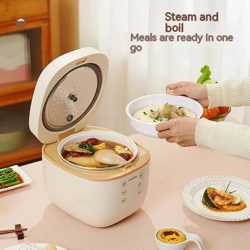 White or beige 3L rice cooker with black inner pot, rice scoop, measuring cup and steamer basket