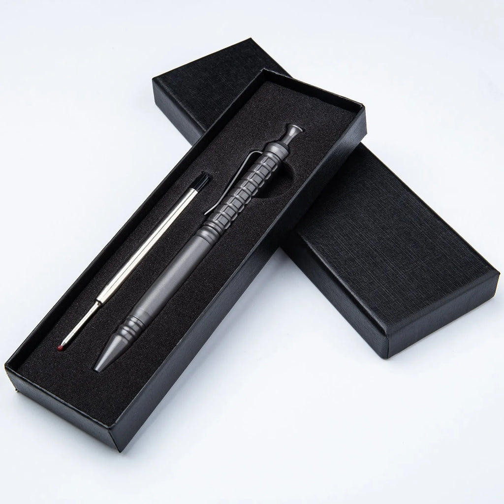 Gunmetal grey titanium tactical pen with push-action decompression mechanism