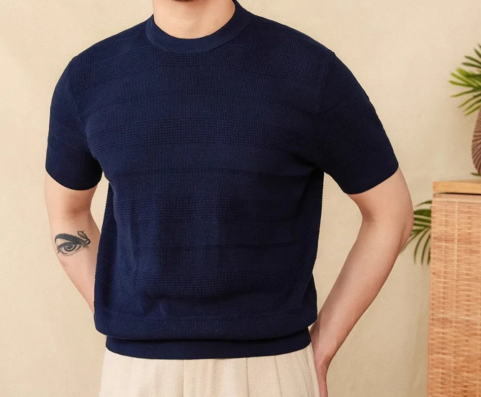 Men's retro-style short-sleeved cotton T-shirt on a hanger, shown in off-white and royal blue colour options.