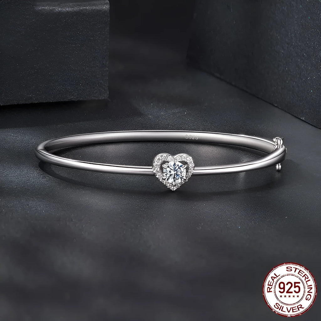 S925 sterling silver D-colour moissanite love bracelet on a plain background showing the chain and stone