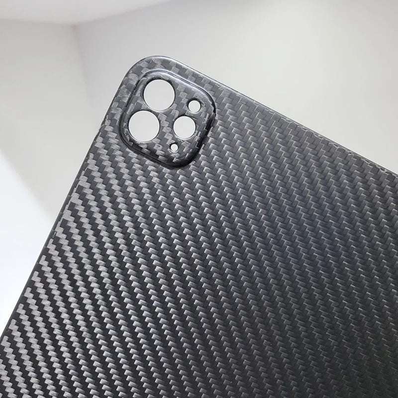 Genuine carbon fibre hard protective case for Apple iPad Pro 11 on a table.