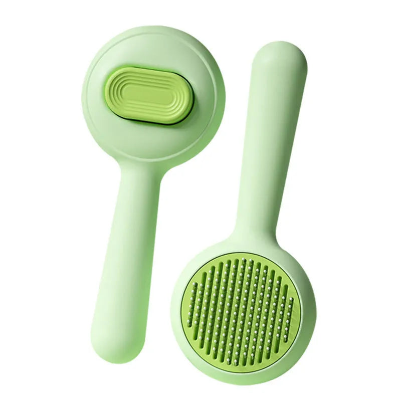 Stainless steel cat grooming brush with non-slip handle in green and yellow colour options