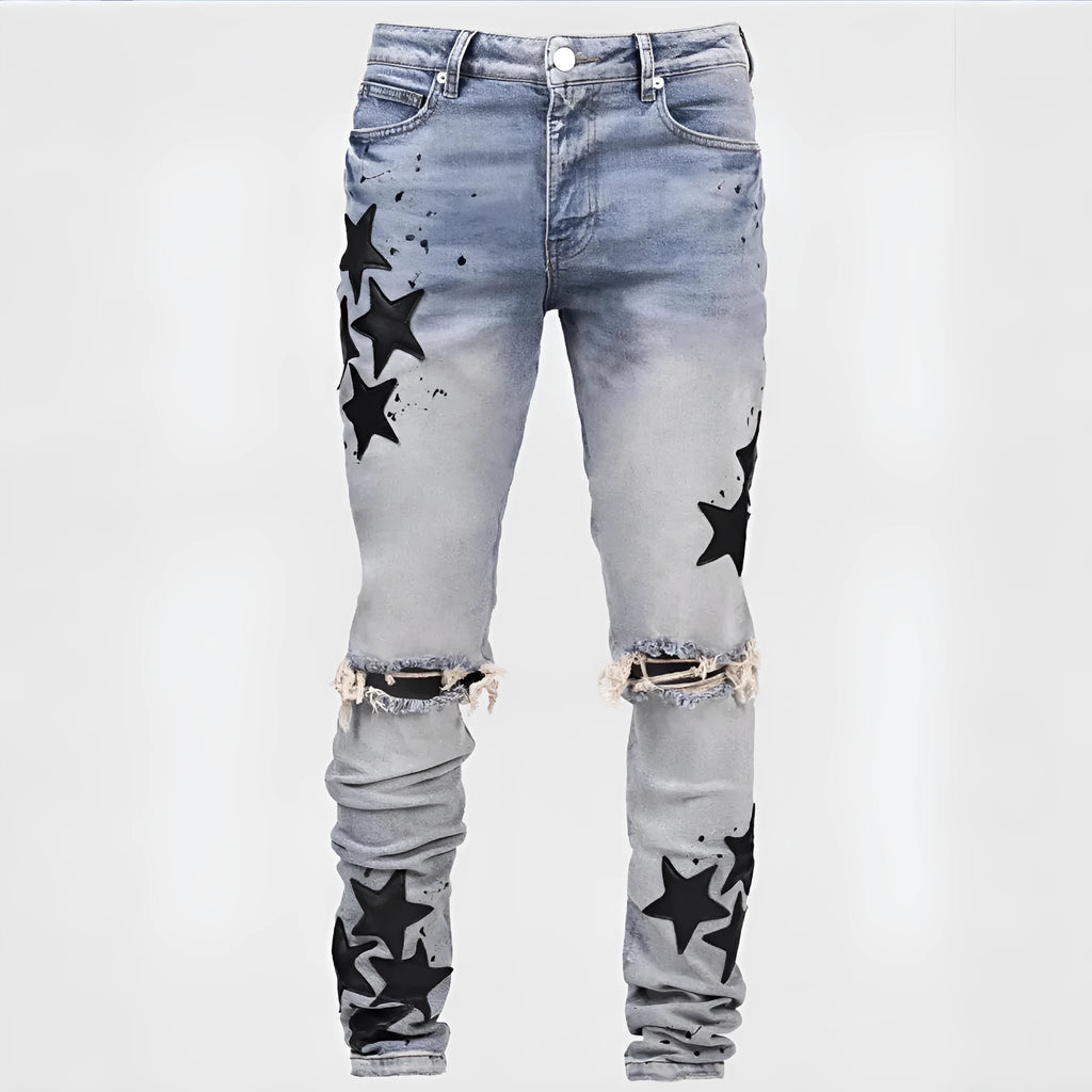 Men's slim blue jeans with embroidery detail on the leg, showing a mid-waist fit.