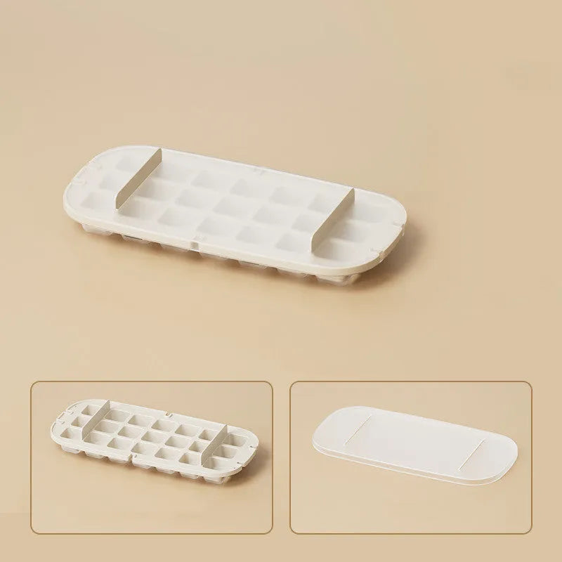 High capacity ice cube tray in blue colour with ice shovel stored in dedicated compartment