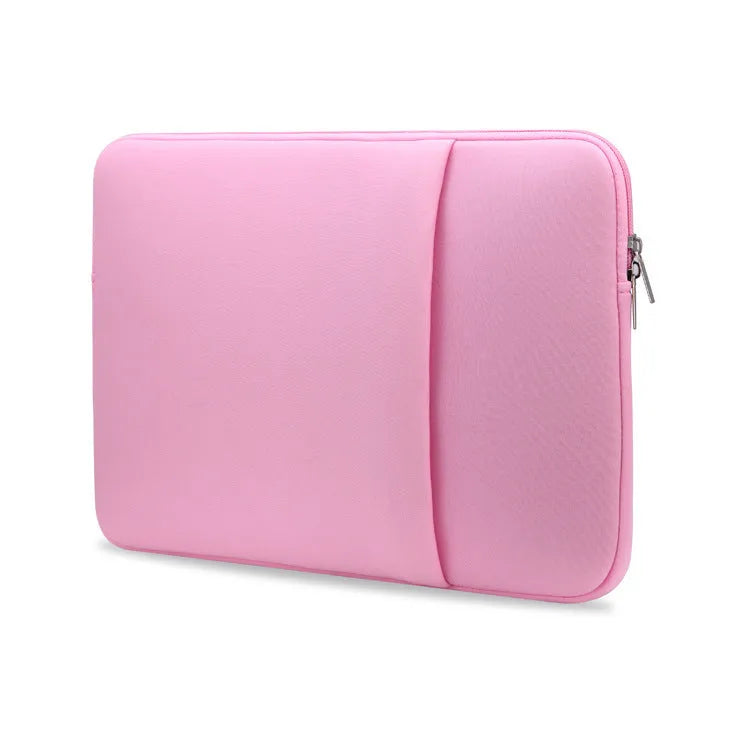 Canvas laptop sleeve in grey with zipper closure, internal pockets, and cotton lining for 15.6 inch computer