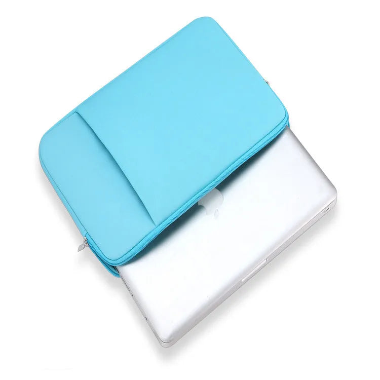 Canvas laptop sleeve in grey with zipper closure, internal pockets, and cotton lining for 15.6 inch computer