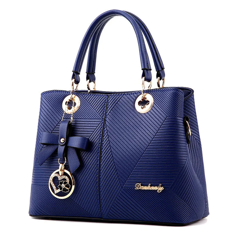 Retro fashion handbag in PU leather with a single shoulder strap and zipper closure.