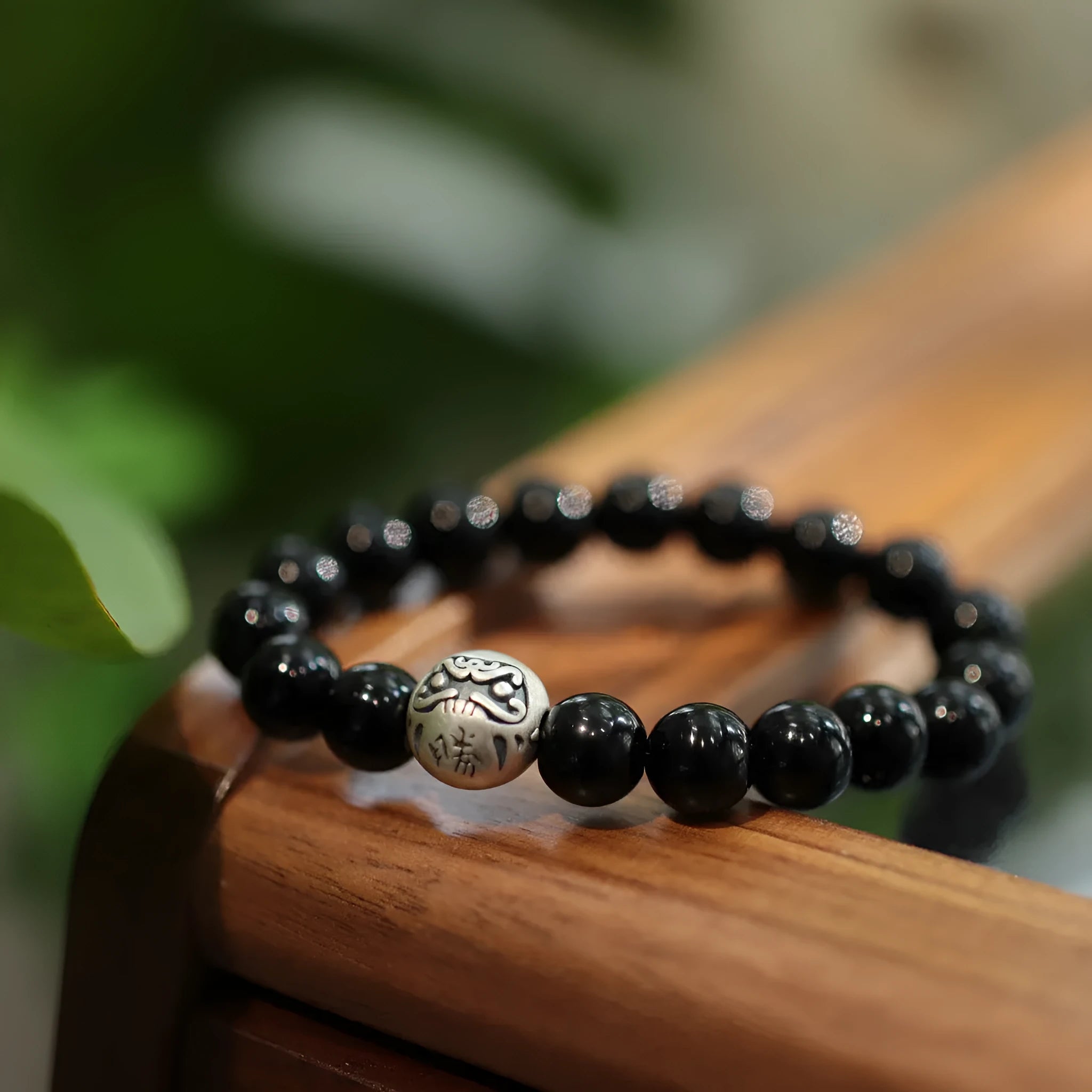 Chinese-style black agate bracelet with 10mm beads and sterling silver clasp