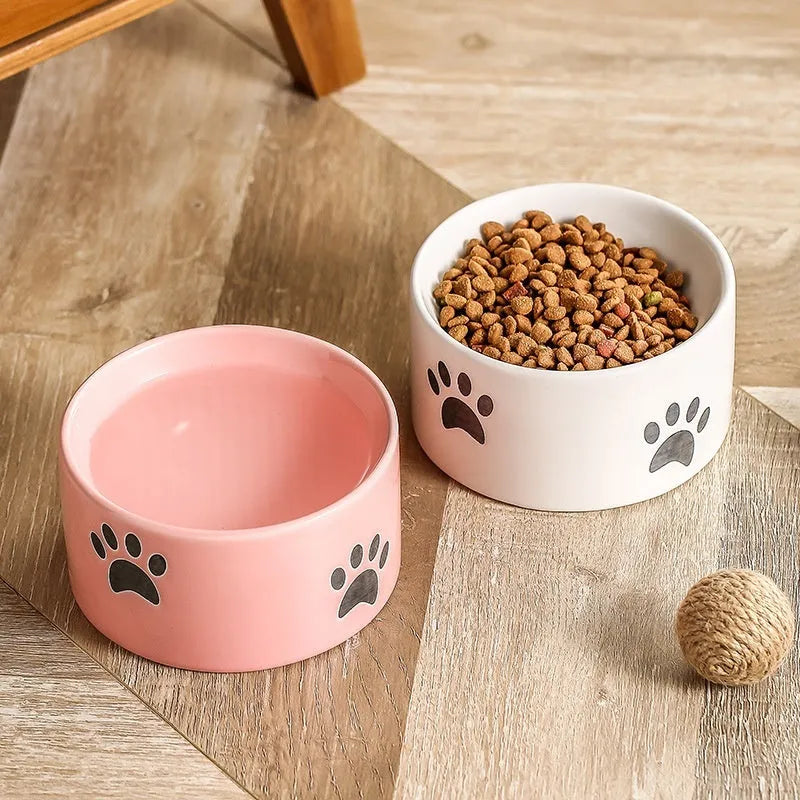 Ceramic cat bowl with neck protection design and cat's paw pattern in selected colour