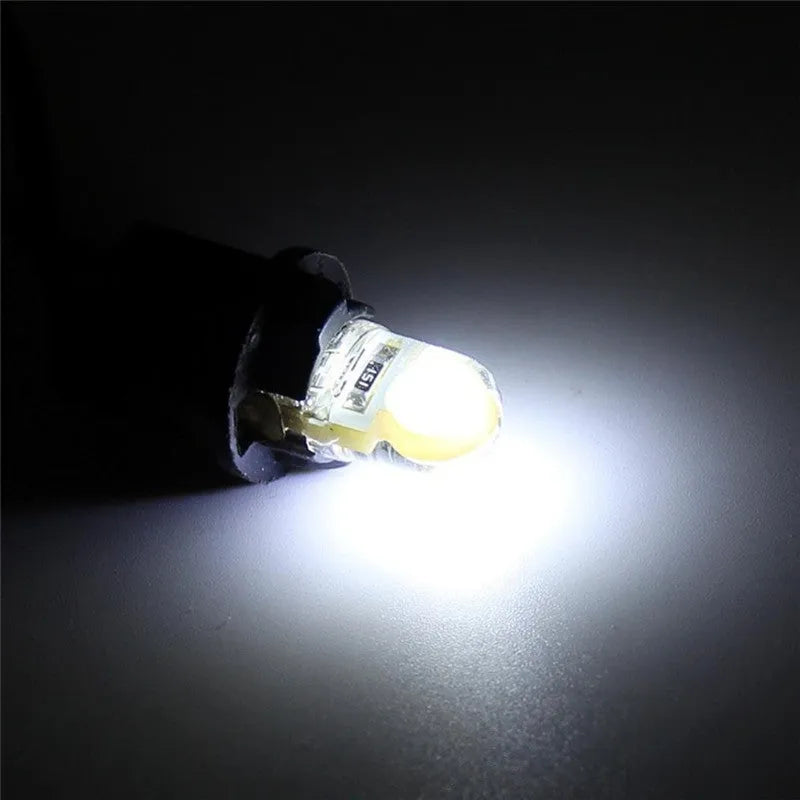 Pack of ten multi-colour T10 LED bulbs for 12V car side marker and interior light replacement.