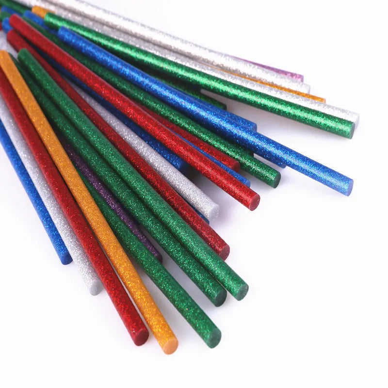 Pack of 10 colorful hot melt glue sticks with gold leaf and luminous effects, 7.2mm and 11.2mm diameters, in various lengths.