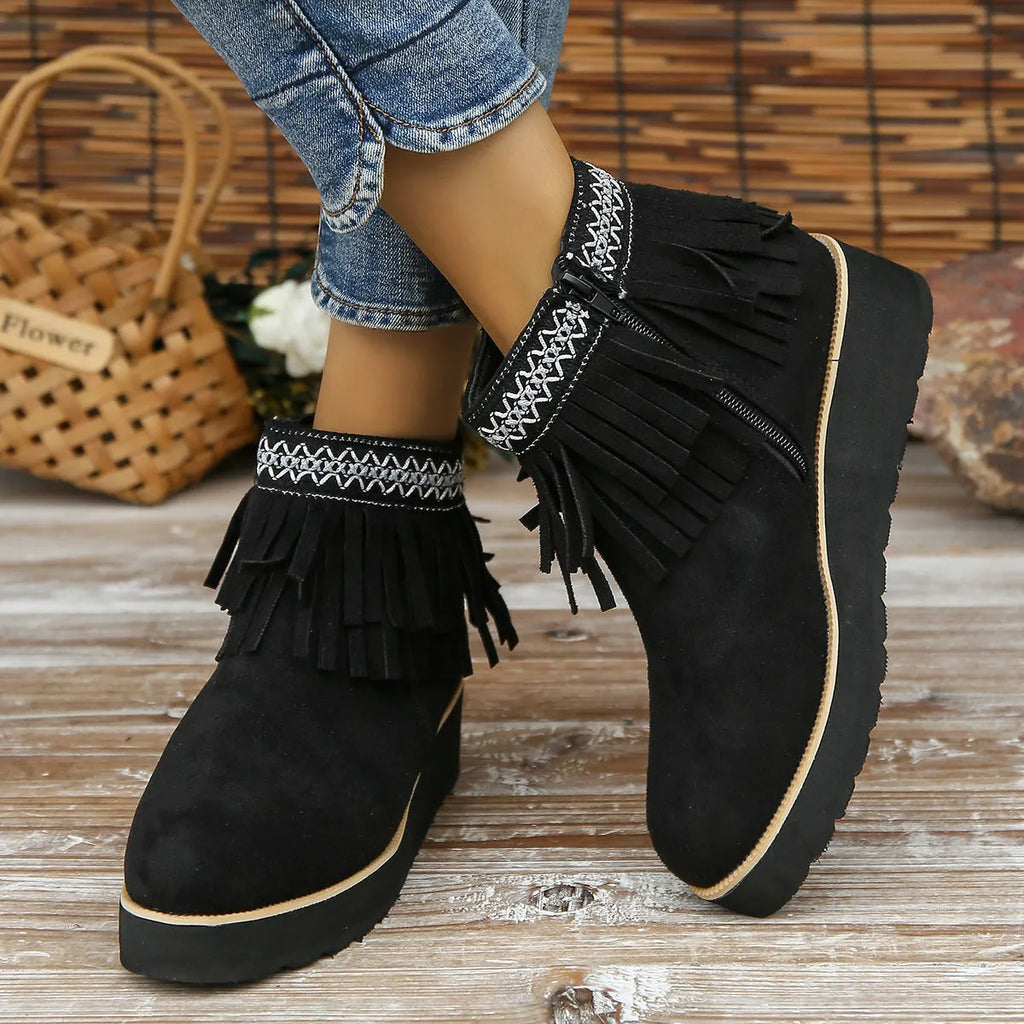 Women's suede wedge ankle boot with thick rubber sole and side zip in black, blue, or dark brown