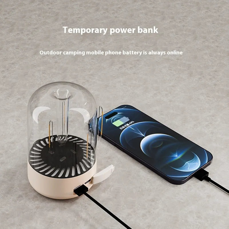 Beige rechargeable LED camping tent light with analog brightness knob and USB port on a wooden surface.
