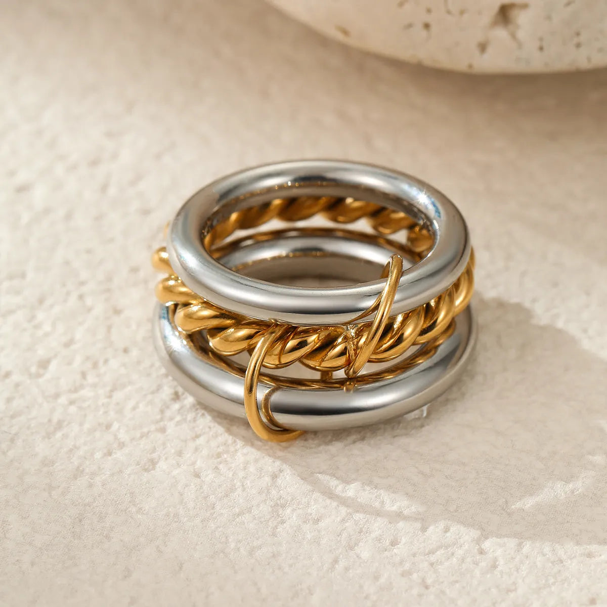 Stackable stainless steel ring with 18K gold plating in three colour options for women