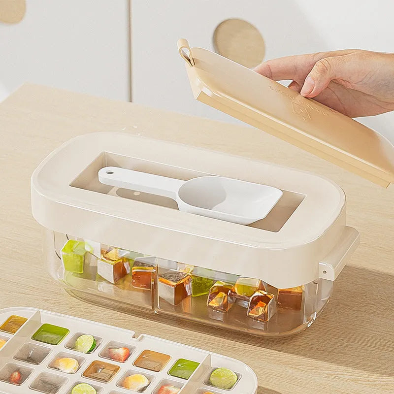 High capacity ice cube tray with leverage handle and stored ice shovel in blue colour