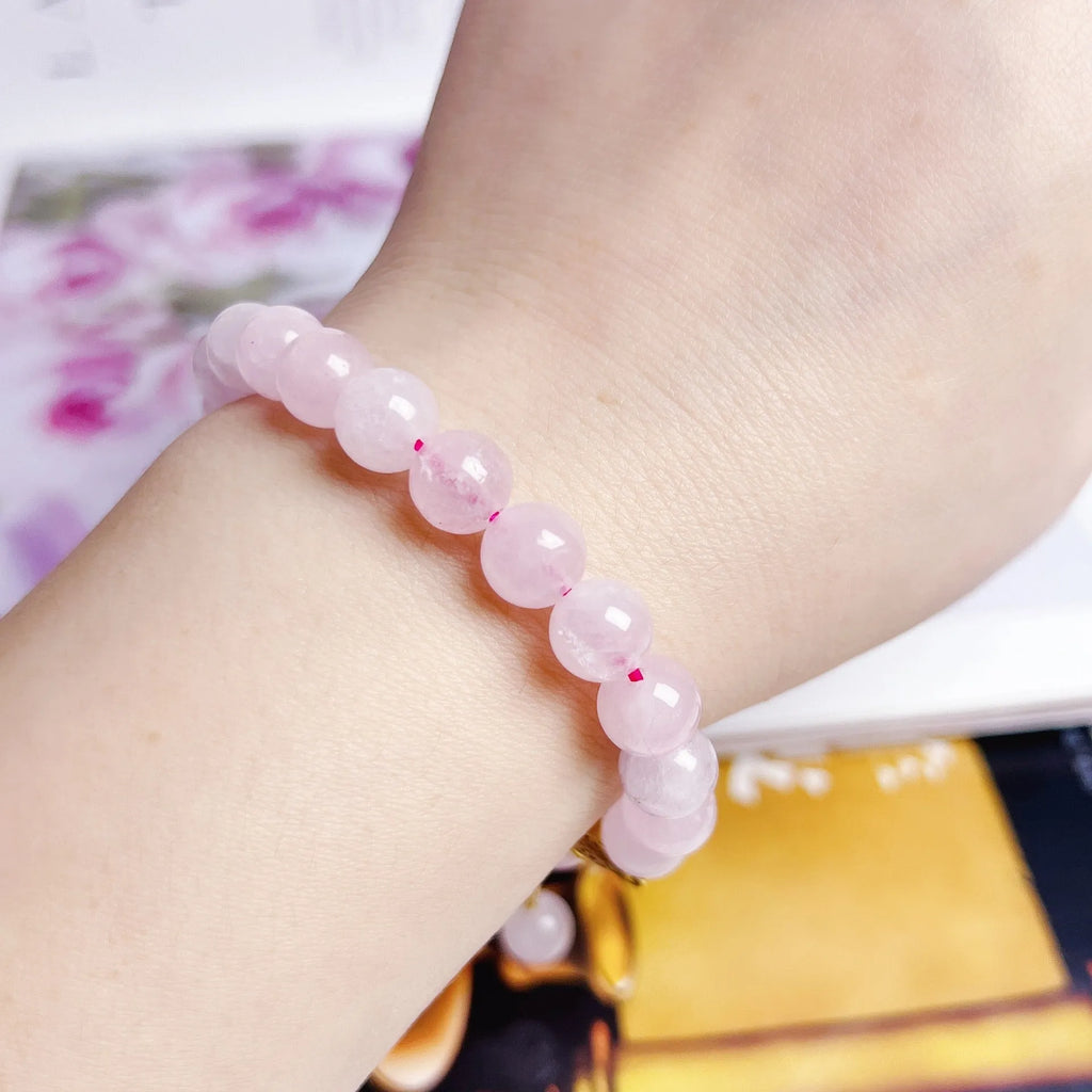 Pink crystal bracelet with peach blossom charm, handmade women's jewellery