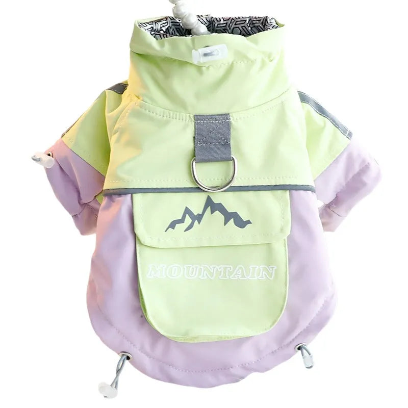 Two-legged dog windbreaker in green or yellow with windproof fabric, soft lining, tall collar, and built-in D-ring.