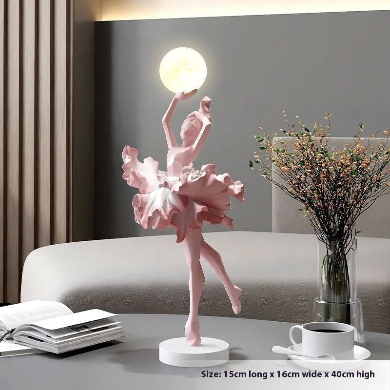 Small modern night lamp ornament in resin showing colour options: black gold, white, pink, and light blue.