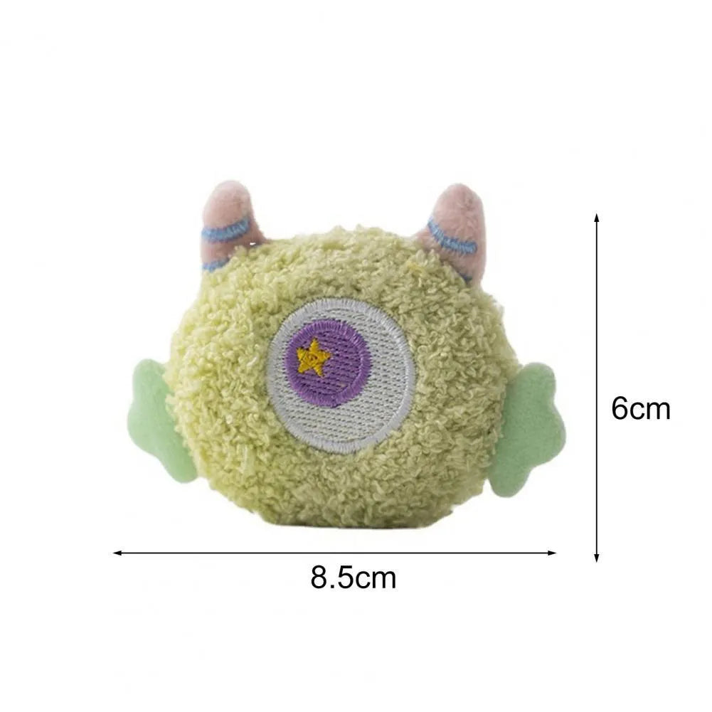 Plush cartoon-shaped dog chew toy with squeaker in assorted colours on white background