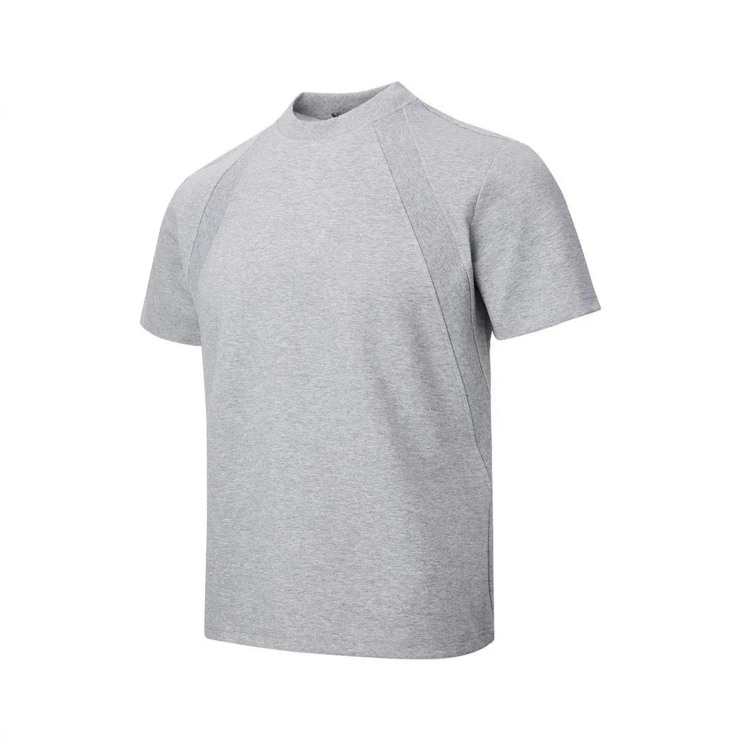 Loose fit short sleeve top with textured air layer stitching on polyester fabric.