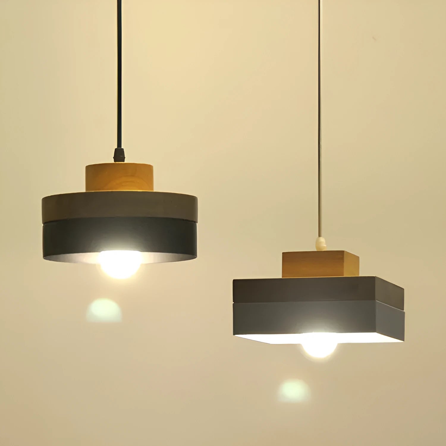 Wooden fish line chandelier with adjustable drop and matte black or white round or square finish.