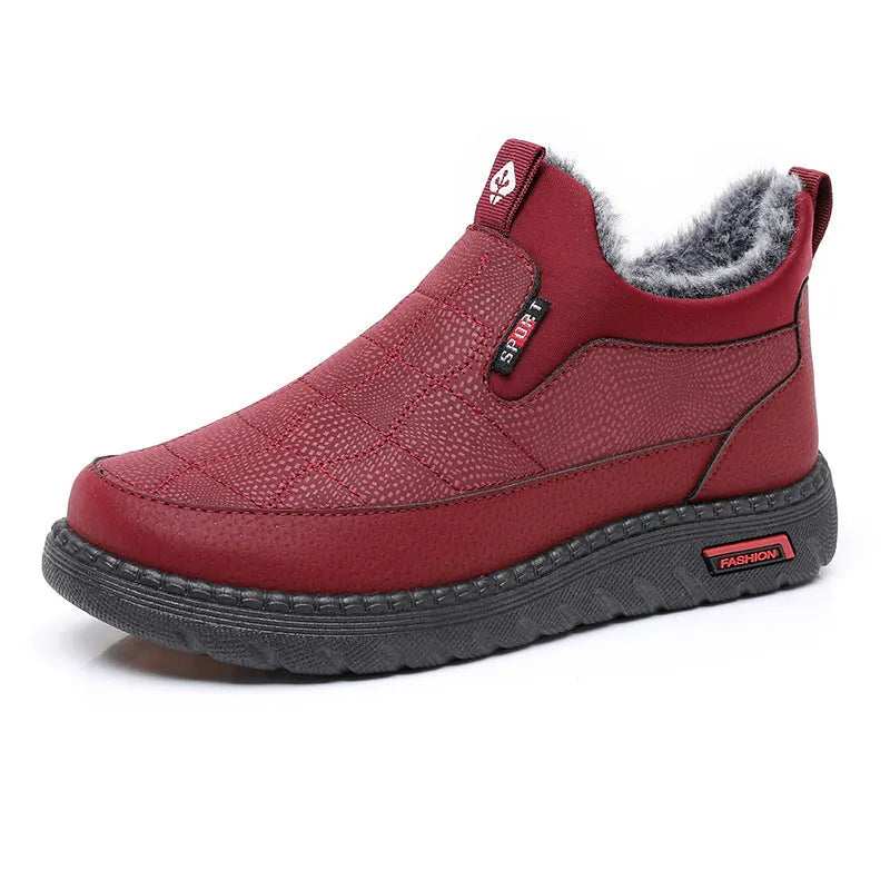 Women's black casual flat ankle boots with round toe and low shaft on a white background.