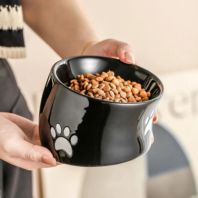 Ceramic cat bowl with neck protection design and cat's paw pattern in selected colour