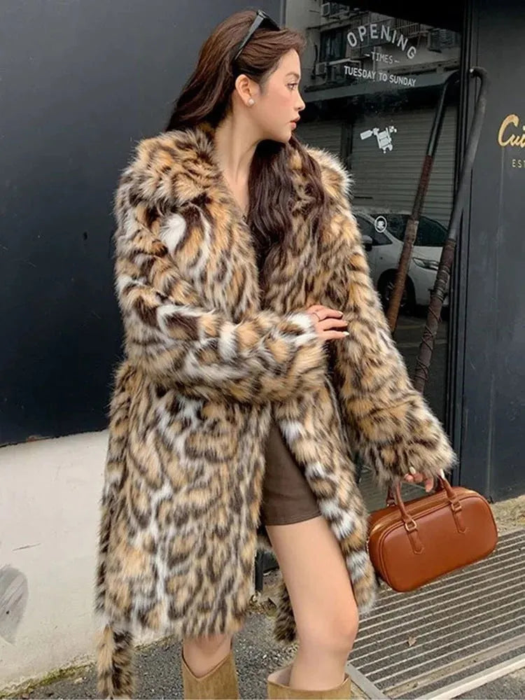Artificial fox fur coat with fur collar in street fashion style with pockets