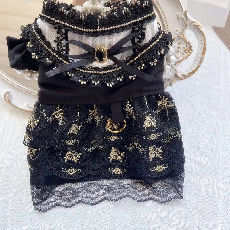 Golden gothic-style princess skirt for a small dog or cat on a mannequin.