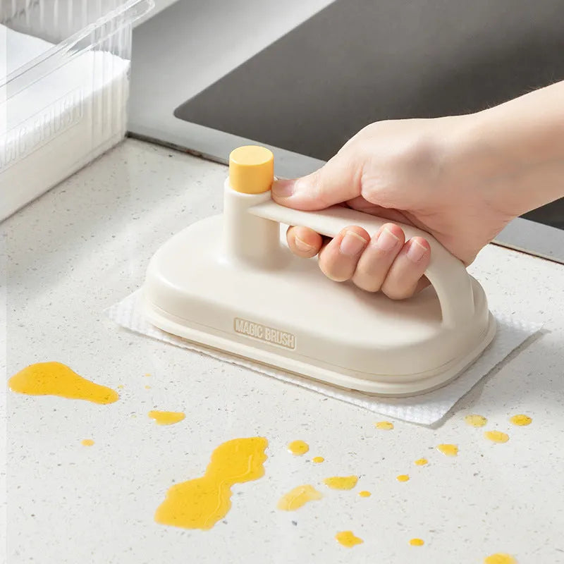Magic Brush disposable cleaning tool with plastic handle, storage box, and 50 white non-woven fabric rag refills.