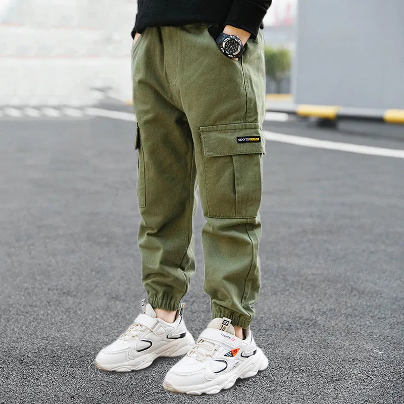 Boys' casual cotton trousers in khaki colour for summer, shown on a size chart.