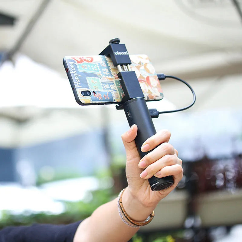 Black aluminium alloy portable charging handle with integrated carry handle, showing compact size.