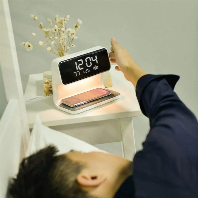 White 3-in-1 bedside table lamp with wireless charging pad, LCD screen, and touch dimmer.