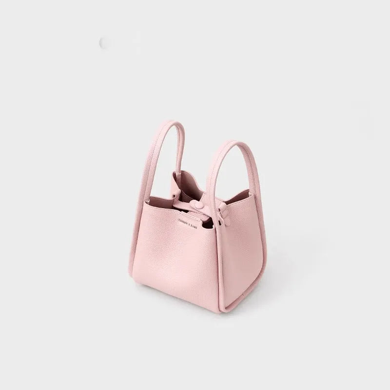 Genuine leather bucket shoulder bag for women, 20x16x19cm, pink colour, with sewing thread and lock detail