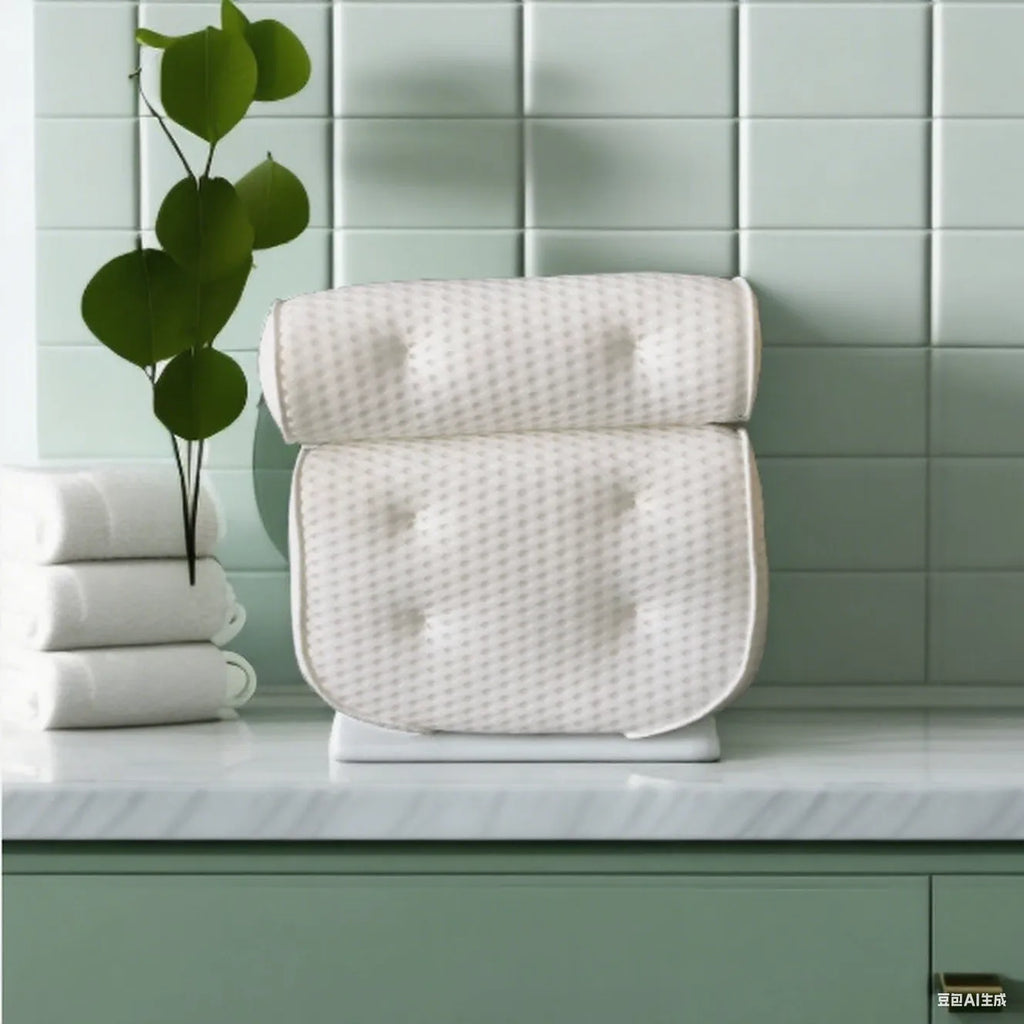 White 4D mesh bathtub pillow with suction cups on a bathtub
