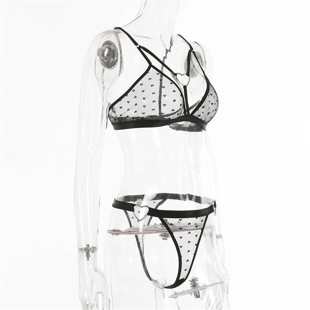 Ladies' black mesh spandex two-piece athletic set with matching top and trousers.
