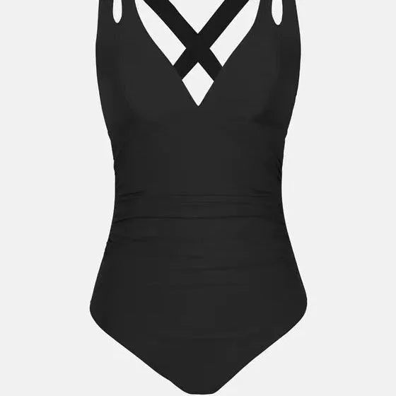Solid colour one-piece swimsuit with cross shoulder straps showing triangle design and nylon lining details