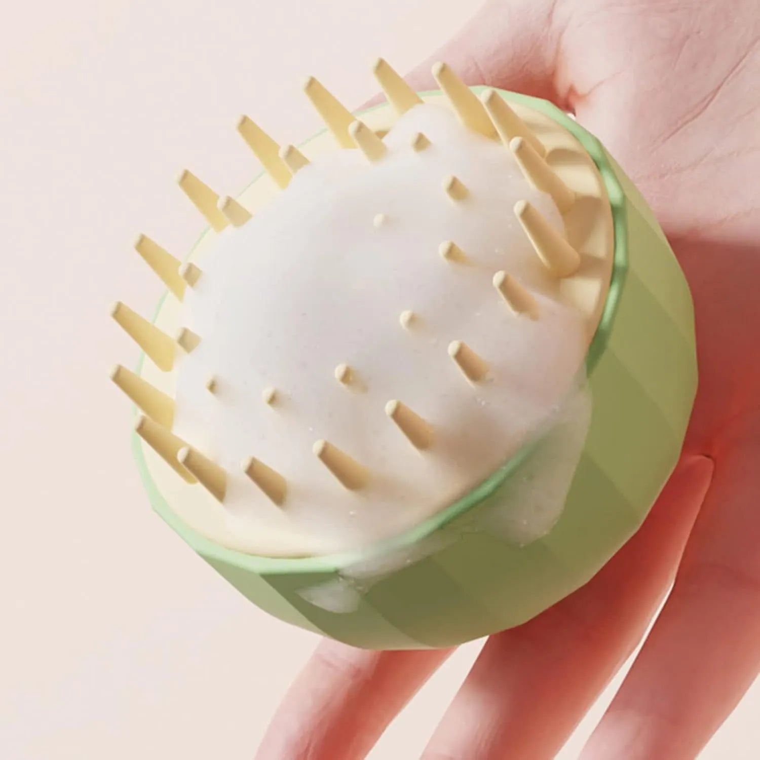 Green pet shampoo massage brush with drainage holes and dual-sided head for washing dogs and cats
