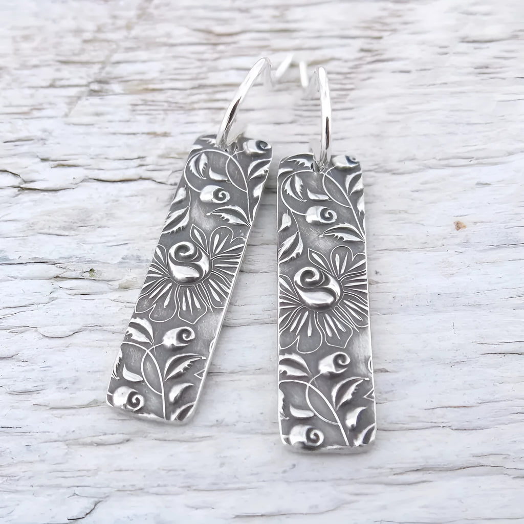 Silver geometric long earrings with carved vine patterns on zinc alloy