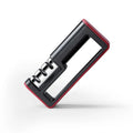Professional three-stage knife sharpener in black with red trim, showing coarse, ceramic and fine abrasive slots.