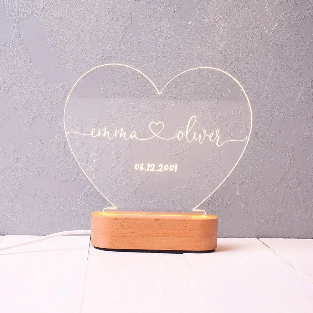 Custom acrylic night light with personalised names and date, showing dimensions of 20cm by 11.5cm.