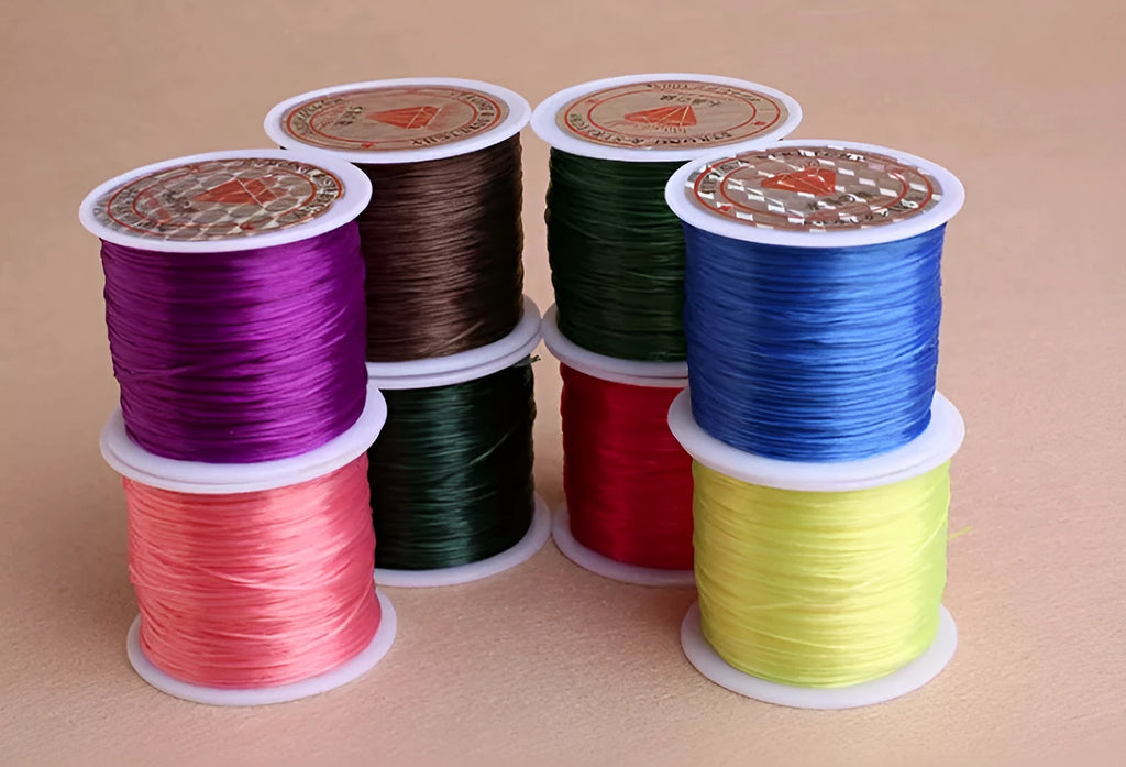 Elastic wire chain rubber beading cord for bracelets and necklaces, shown in assorted colours